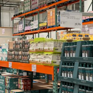 Bulk products displayed on shelves in a wholesale warehouse setting.